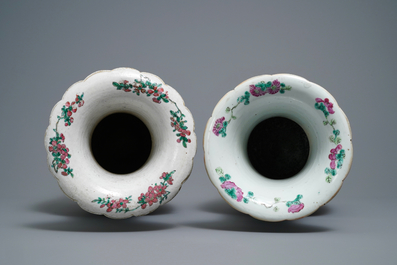 Two Chinese famille rose 'court scene' vases, 19th C.