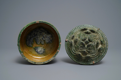 A Chinese green-glazed pottery tripod 'hill' jar, Han