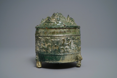 A Chinese green-glazed pottery tripod 'hill' jar, Han