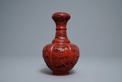 A Chinese carved cinnabar lacquer bottle vase, 19/20th C.