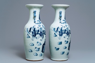 A pair of Chinese blue and white celadon vases with figures, 19th C.