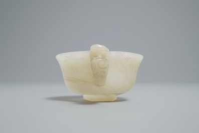 A Chinese pale celadon jade libation cup, 18/19th C.