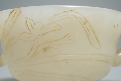 A Chinese pale celadon jade libation cup, 18/19th C.