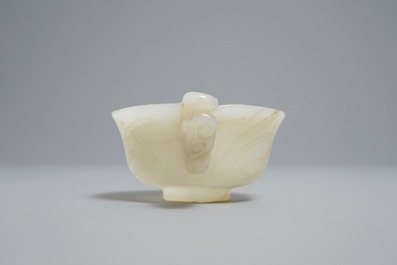 A Chinese pale celadon jade libation cup, 18/19th C.