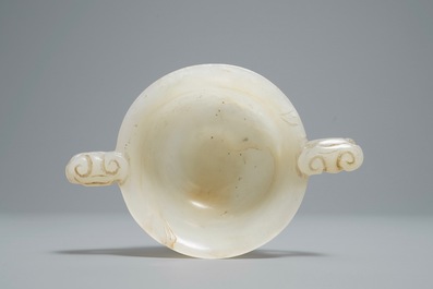 A Chinese pale celadon jade libation cup, 18/19th C.