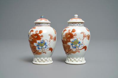 A pair of Chinese iron red and gilt tea caddies and covers, Yongzheng