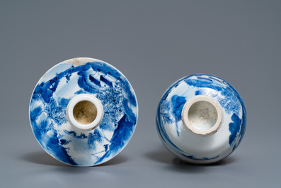 A pair of Chinese blue and white candlesticks and three famille rose figures of boys, 19th C.