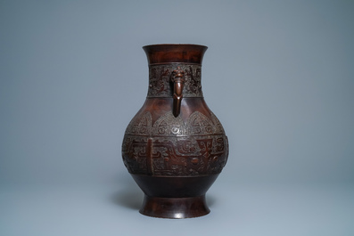 A Chinese archaic bronze vase, Zuo zisun yong mark, 18th C.