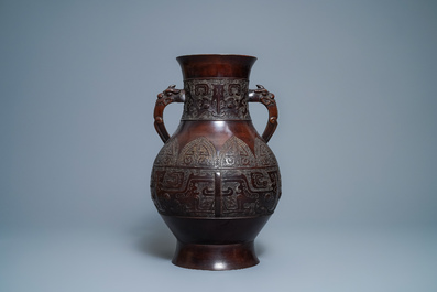 A Chinese archaic bronze vase, Zuo zisun yong mark, 18th C.