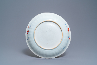 Un plat armori&eacute; 'Frislande' en porcelaine de Chine famille verte, Kangxi/Yongzheng