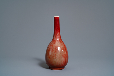 A Chinese monochrome sang-de-boeuf bottle vase in wooden presentation box, Republic