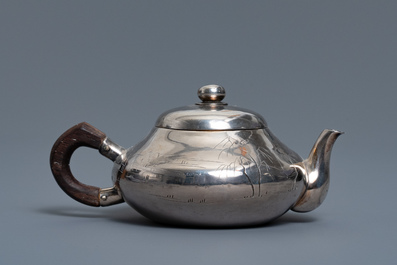 A Chinese silver teapot and cover, impressed mark, 19/20th C.