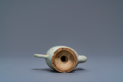 A Chinese miniature peach-shaped cadogan teapot with junyao glaze, Kangxi/Qianlong