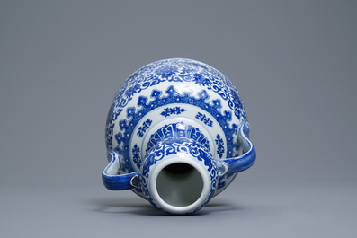 A Chinese blue and white two-handled 'lotus scroll' jug, Qianlong mark, 19/20th C.