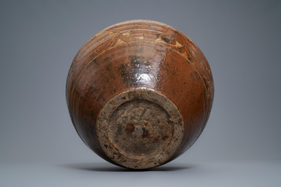 A Chinese brown-glazed cizhou jar with incised design, Yuan
