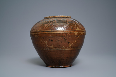 A Chinese brown-glazed cizhou jar with incised design, Yuan