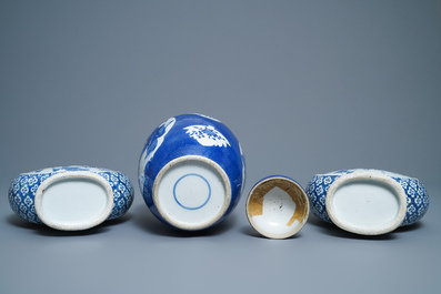 A pair of Chinese blue and white 'moonflask' vases and a covered jar, 19th C.