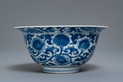 A Chinese blue and white bowl with floral scrolls, Kangxi