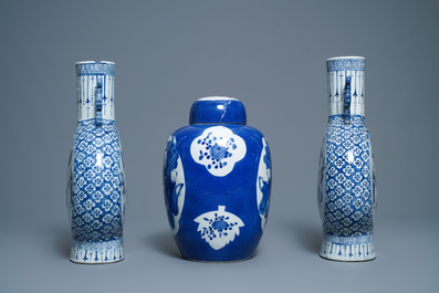 A pair of Chinese blue and white 'moonflask' vases and a covered jar, 19th C.