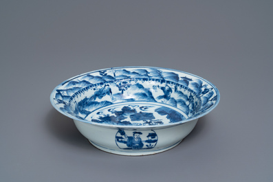 A Chinese blue and white basin with figures in a landscape, Wanli