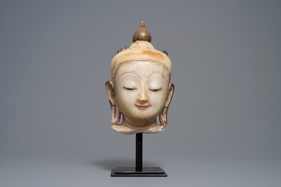 A gilt-lacquered alabaster head of Buddha, Burma, 19th C.