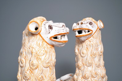 An impressive pair of large Portuguese faience models of lions, 18th C.