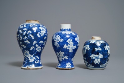 Three Chinese blue and white 'prunus on cracked ice' vases, Kangxi