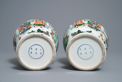 A pair of Chinese famille verte vases with figures on a terrace, Kangxi mark, 19th C.