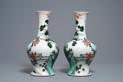 A pair of Chinese famille verte vases with figures on a terrace, Kangxi mark, 19th C.
