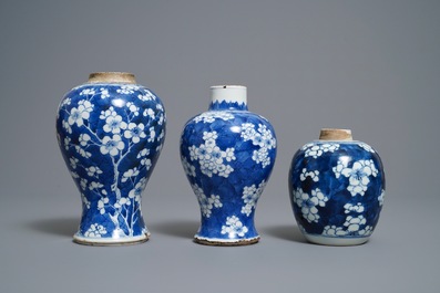 Three Chinese blue and white 'prunus on cracked ice' vases, Kangxi