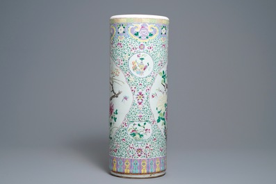 A Chinese famille rose cylindrical vase with birds among flowers, 19th C.