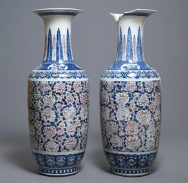 A pair of large Chinese blue, white and underglaze red vases, 19th C.