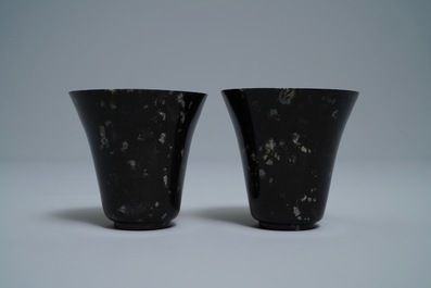 A pair of Chinese dark green jade wine cups, Qing