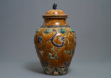 A large Chinese polychrome stoneware martaban jar and cover, Ming/Qing