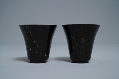 A pair of Chinese dark green jade wine cups, Qing