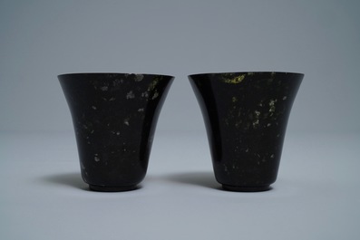 A pair of Chinese dark green jade wine cups, Qing