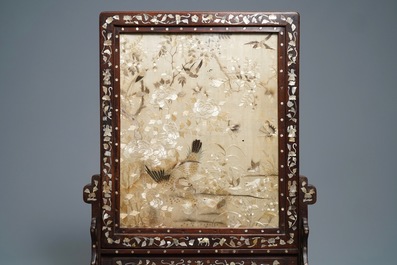 A Chinese mother-of-pearl-inlaid wooden screen with silk embroidery, 19th C.