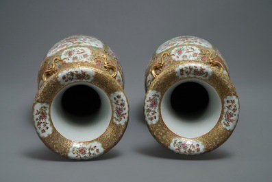 A pair of large Chinese Canton famille rose vases, 19th C.