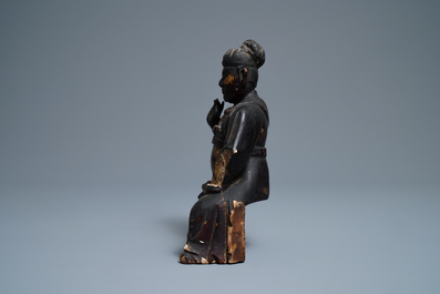 A Chinese gilt-lacquered wood figure of Guan Yu, Ming