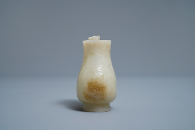 A Chinese celadon russet jade chilong-handled jug, Qing