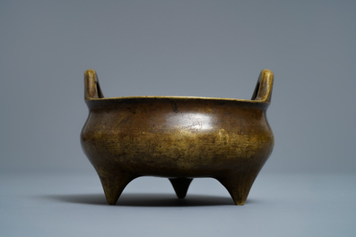 A Chinese bronze tripod censer, Xuande mark, 18/19th C.