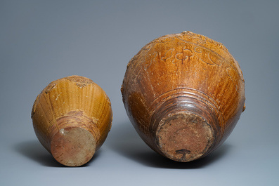 Two Chinese brown-glazed martaban jars with applied design, 18/19th C.