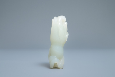 A Chinese celadon jade 'Buddha hand' carving, 19th C.