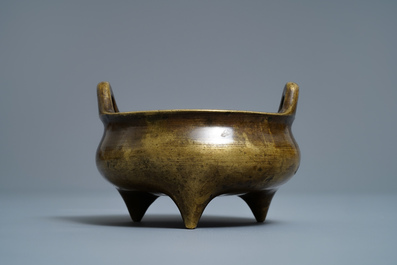 A Chinese bronze tripod censer, Xuande mark, 18/19th C.