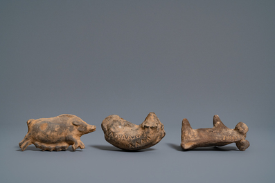 A Chinese earthenware model of a stable and five animals, Han