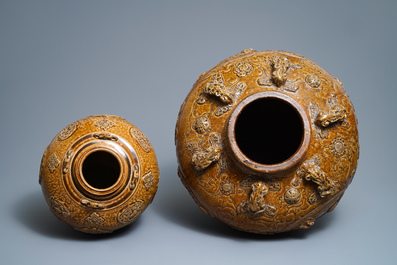 Two Chinese brown-glazed martaban jars with applied design, 18/19th C.