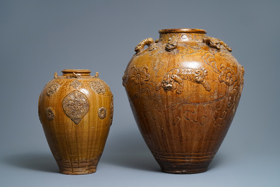 Two Chinese brown-glazed martaban jars with applied design, 18/19th C.