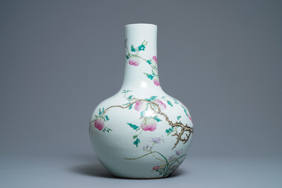 A Chinese famille rose 'peaches' vase, Qianlong mark, 19th C.