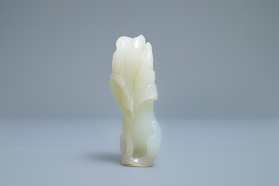 A Chinese celadon jade 'Buddha hand' carving, 19th C.