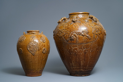 Two Chinese brown-glazed martaban jars with applied design, 18/19th C.